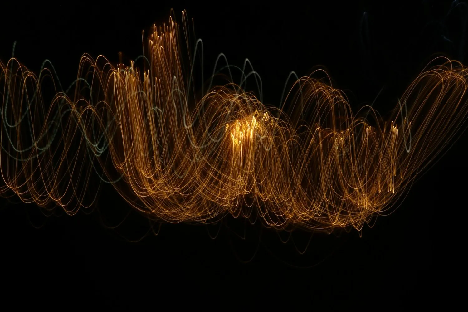 A voice traced in gold light — the conversational interview Q runs to learn a business
